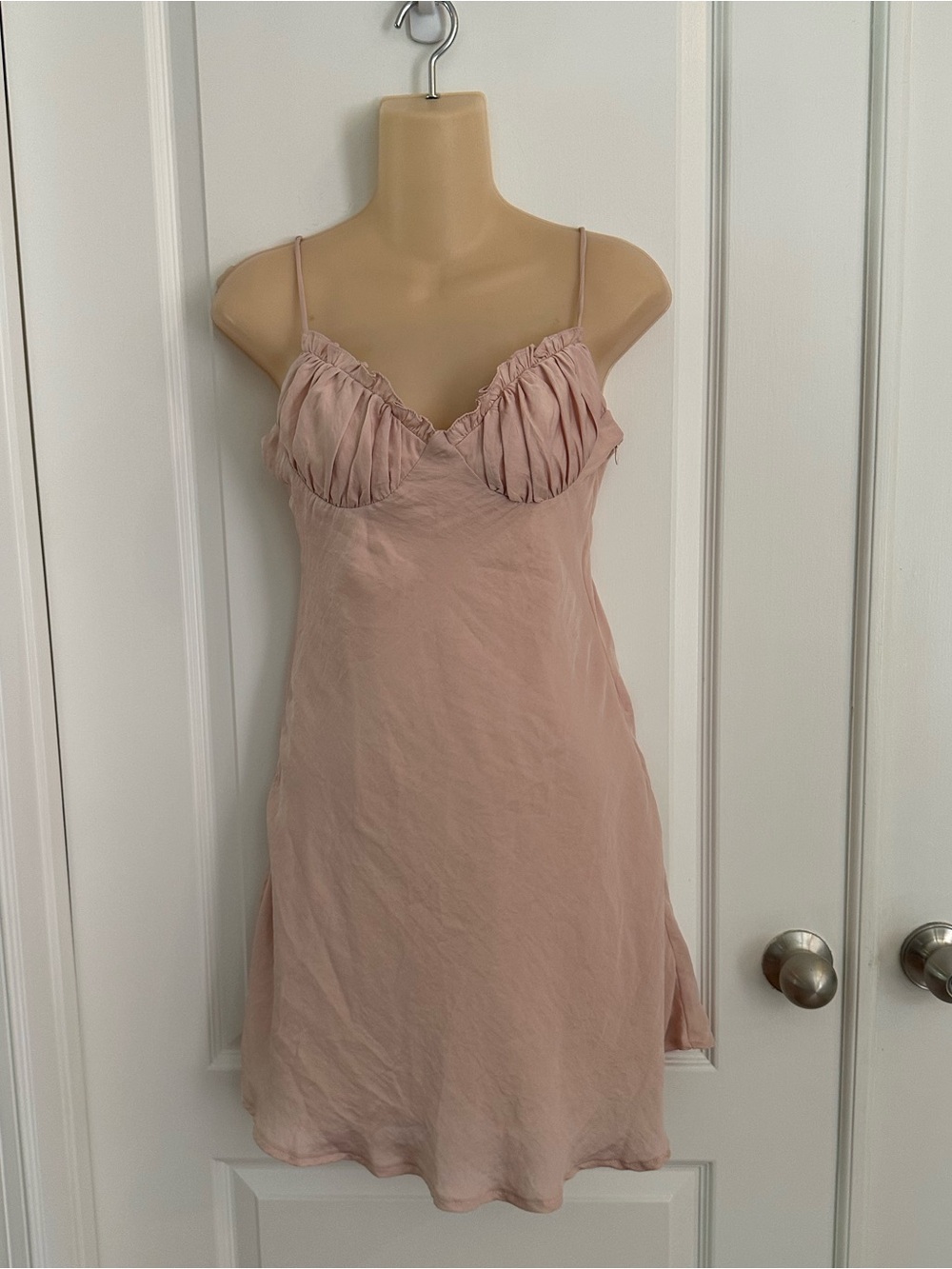 Angel Biba blush pink slip dress featuring a pleated ruffle bodice